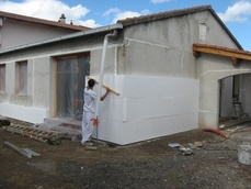 Mise en place d'un isolant de 14 cm